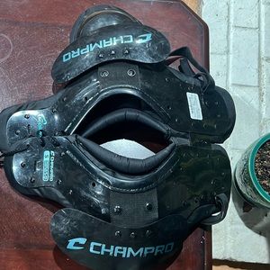 Worn shoulder pads for football